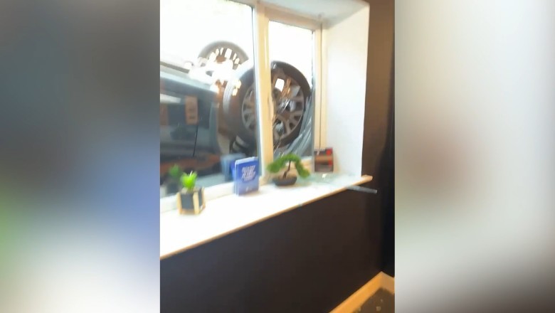 Shocking Car Crash: Flips Over and Crashes Through Gym Window!
