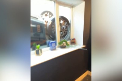Shocking Car Crash: Flips Over and Crashes Through Gym Window!